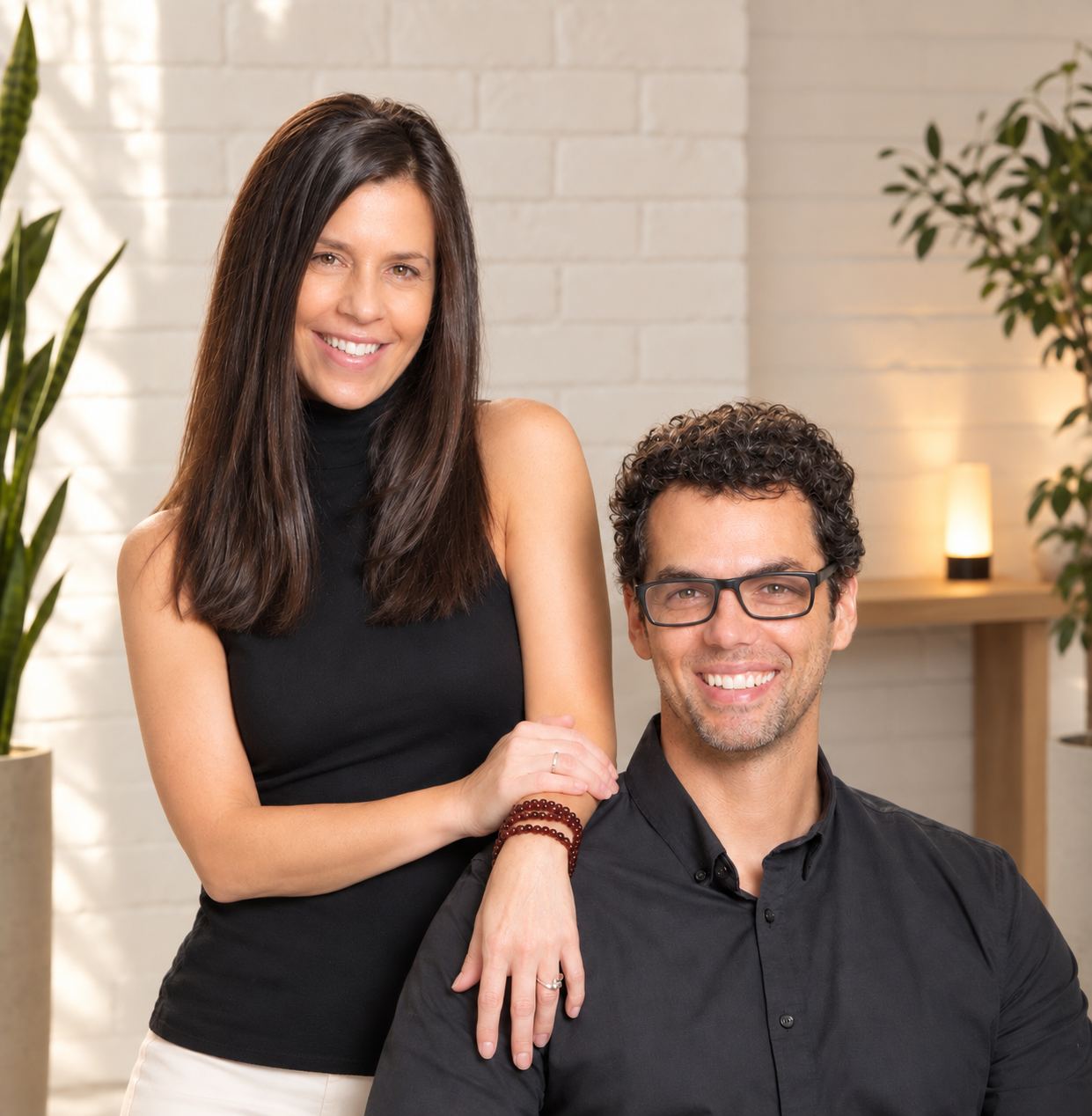 Dr. Julio Reis, DC, ATC, CSCS, leads chiropractic care, and Dr. Jessi Reis, DTCM, LAc, FABORM, leads acupuncture and Traditional Chinese Medicine. 